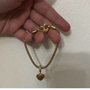 Gold Heart Pendant Bracelet scratches heart